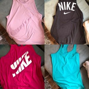 4 Nike tank tops